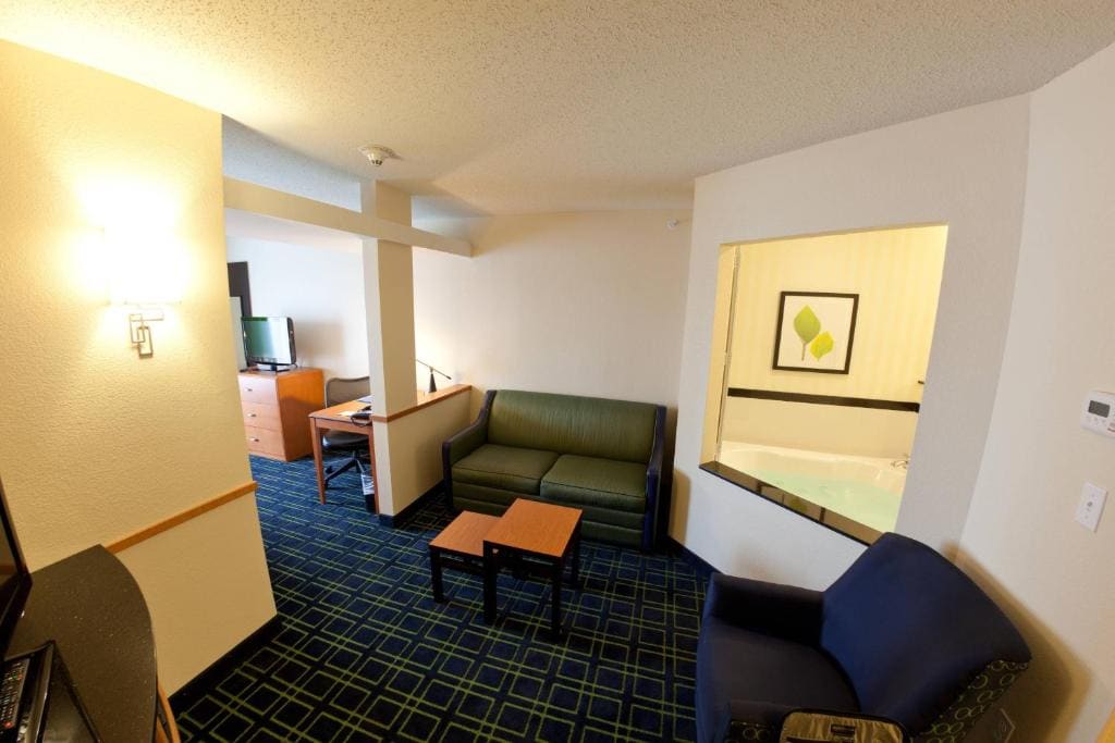 King Suite with Specialty Bathtub and Sofa Bed room - Image 2