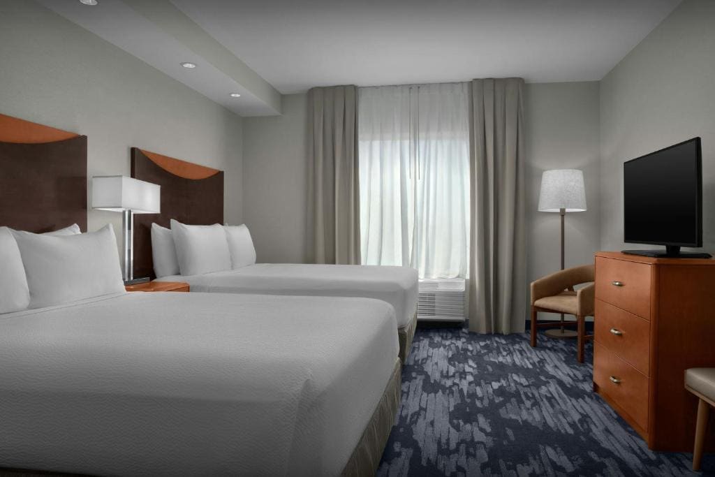 Queen Room with Two Queen Beds with Sofa Bed room - Image 1