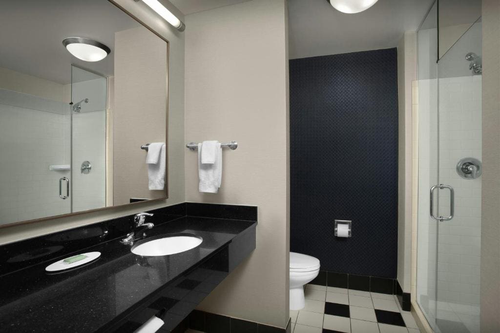 Studio with Two Queen Beds and Sofa Bed room - Image 2