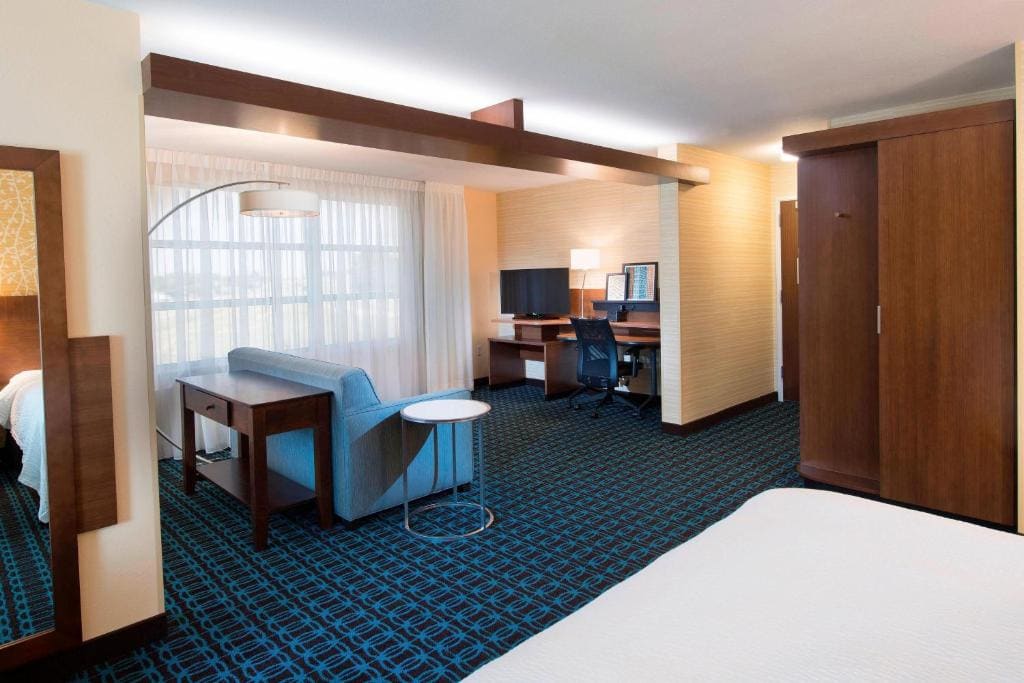 Queen Suite with Two Queen Beds and Sofa Bed room - Image 2
