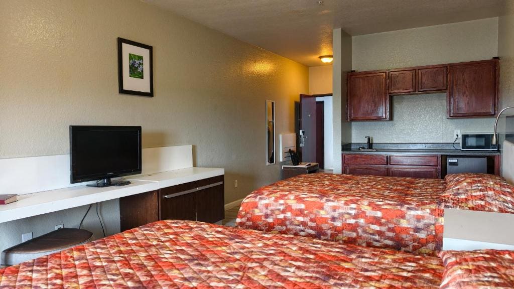 Standard Queen Room with Two Queen Beds room - Image 2