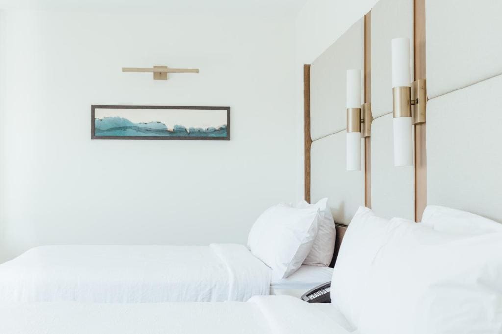 Premium Queen Room with Two Queen Beds room - Image 2