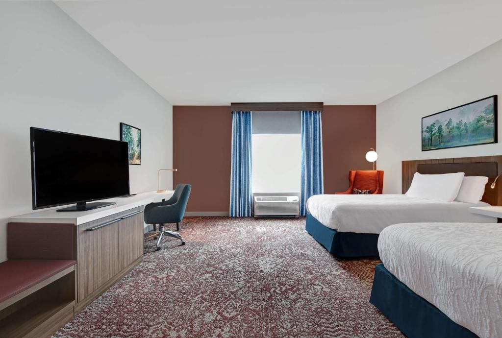 Deluxe Queen Room with Two Queen Beds room - Image 1
