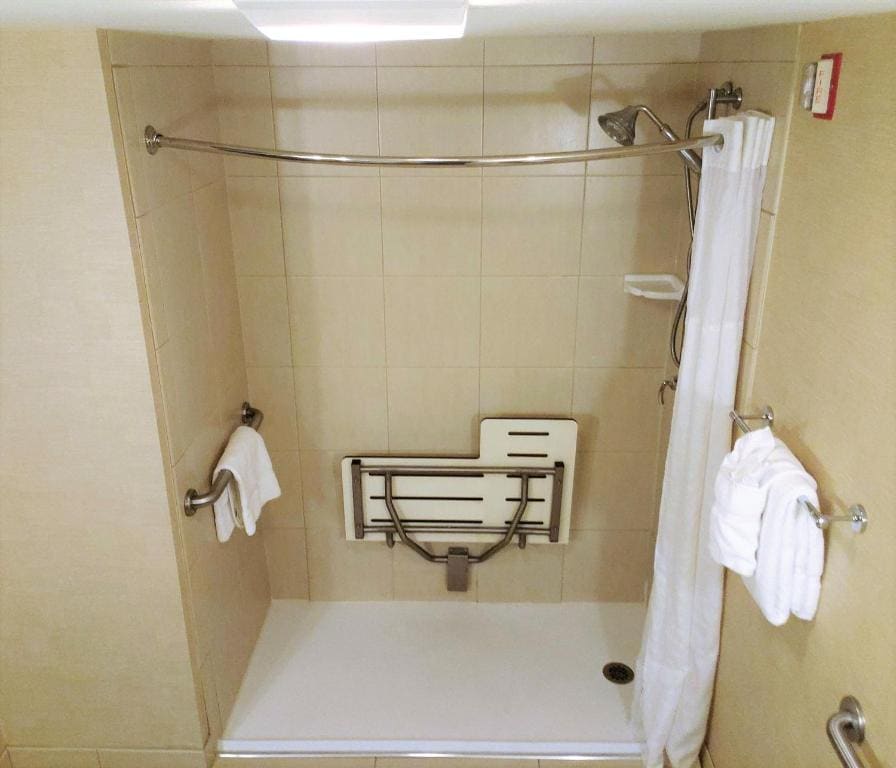 King Room - Hearing Accessible - Roll-in Shower room - Image 1