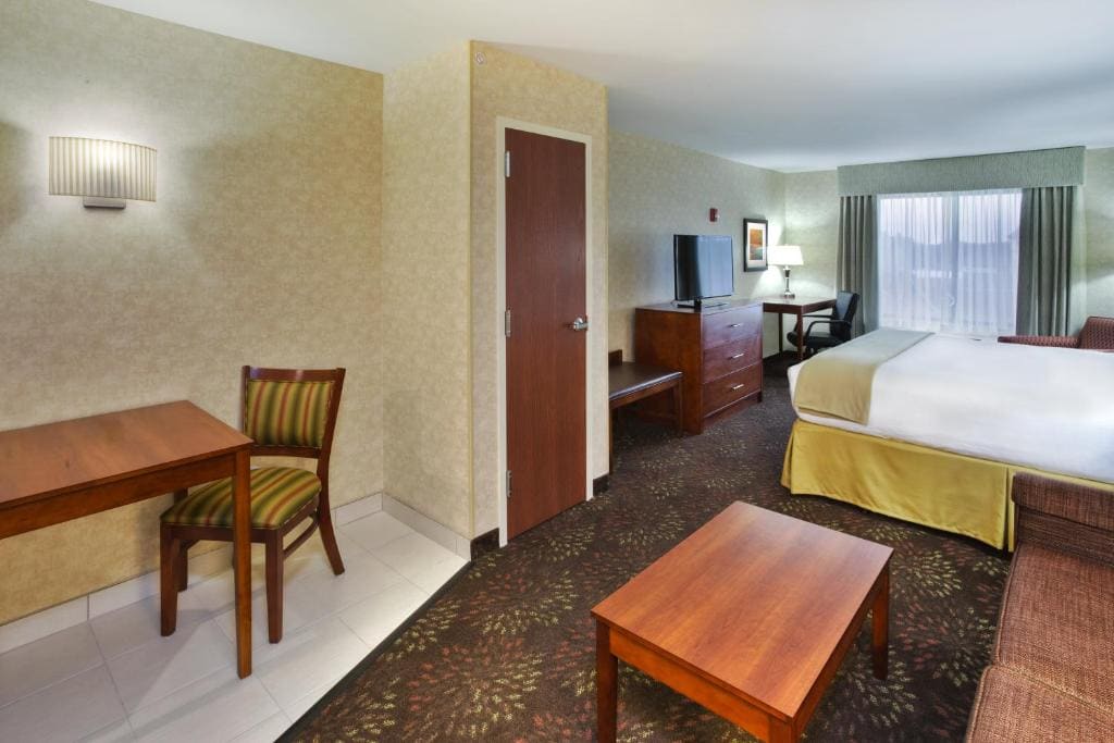 Queen Suite with Two Queen Beds and Sofa Bed room - Image 2