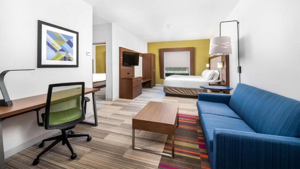 Queen Suite with Two Queen Beds and Additional Living Area room - Image 1