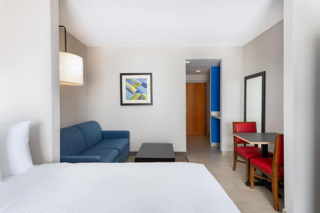 Queen Suite with Two Queen Beds and Sofa Bed room - Image 2