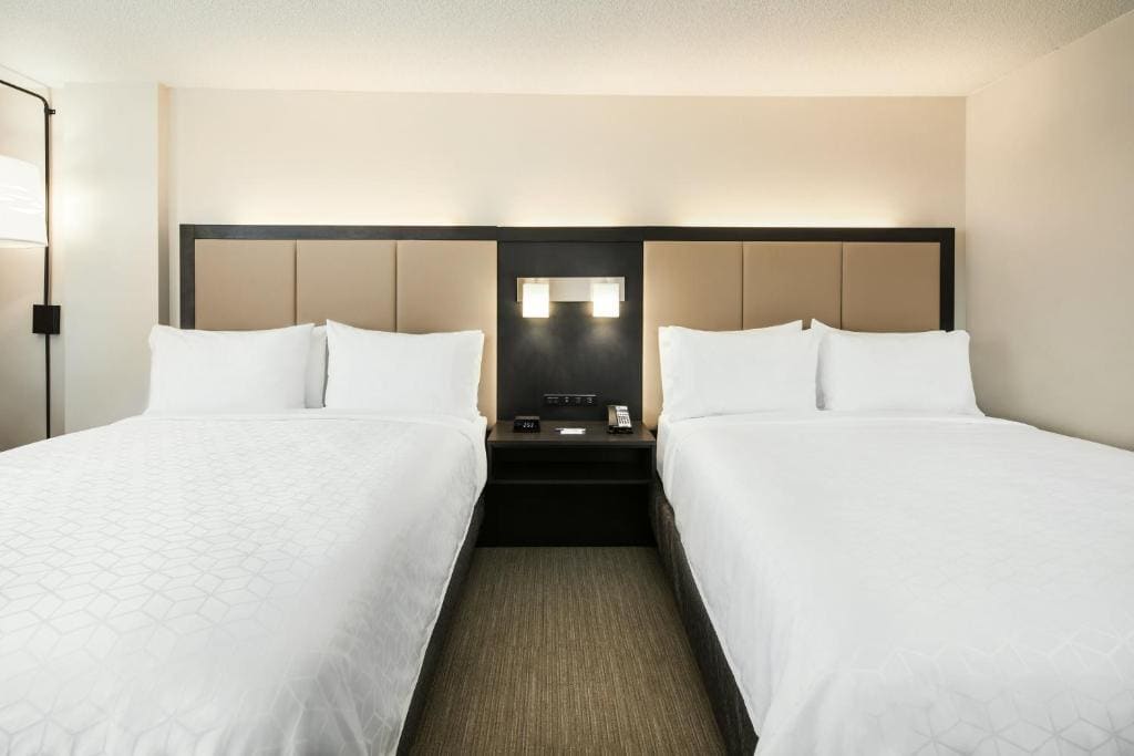 Standard Queen Room with Two Queen Beds room - Image 2
