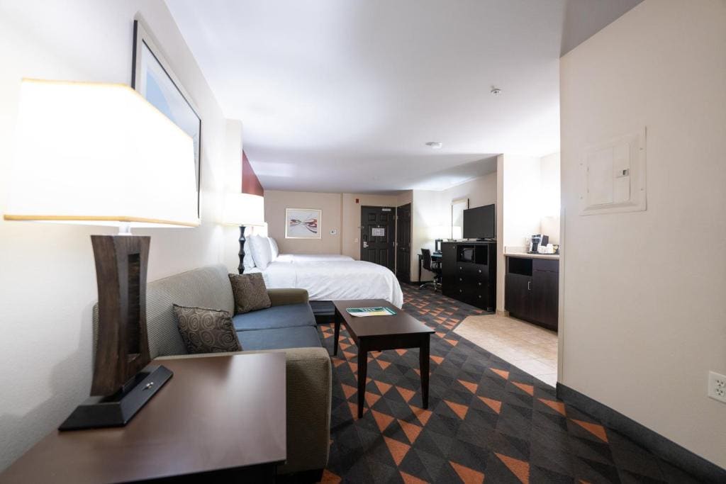 Queen Suite with Two Queen Beds and Sofa Bed room - Image 1