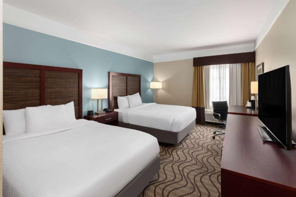 Deluxe Queen Room with Two Queen Beds room - Image 1