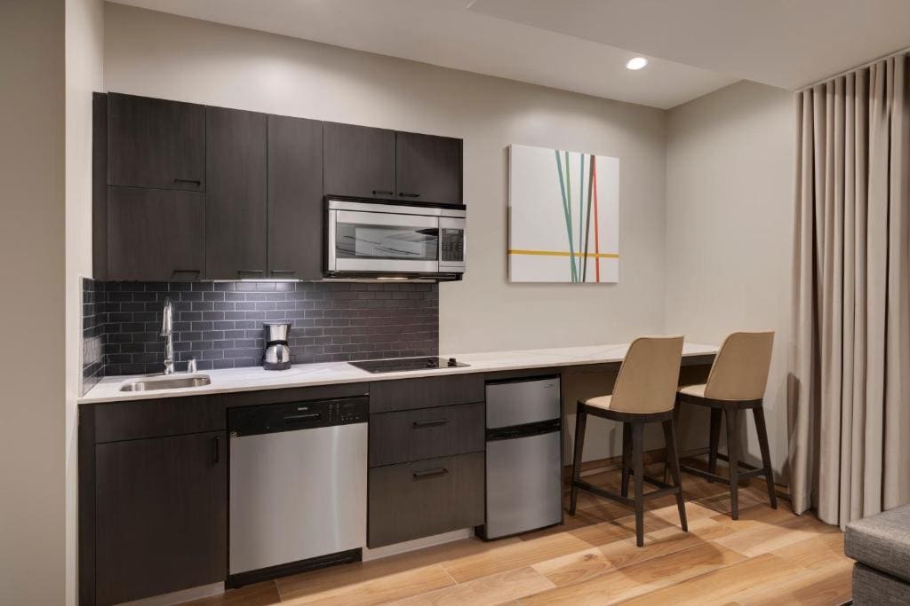 Studio Kitchen Suite (Interior Room) | Two Queen Beds (Plus Sofa Bed) room - Image 3