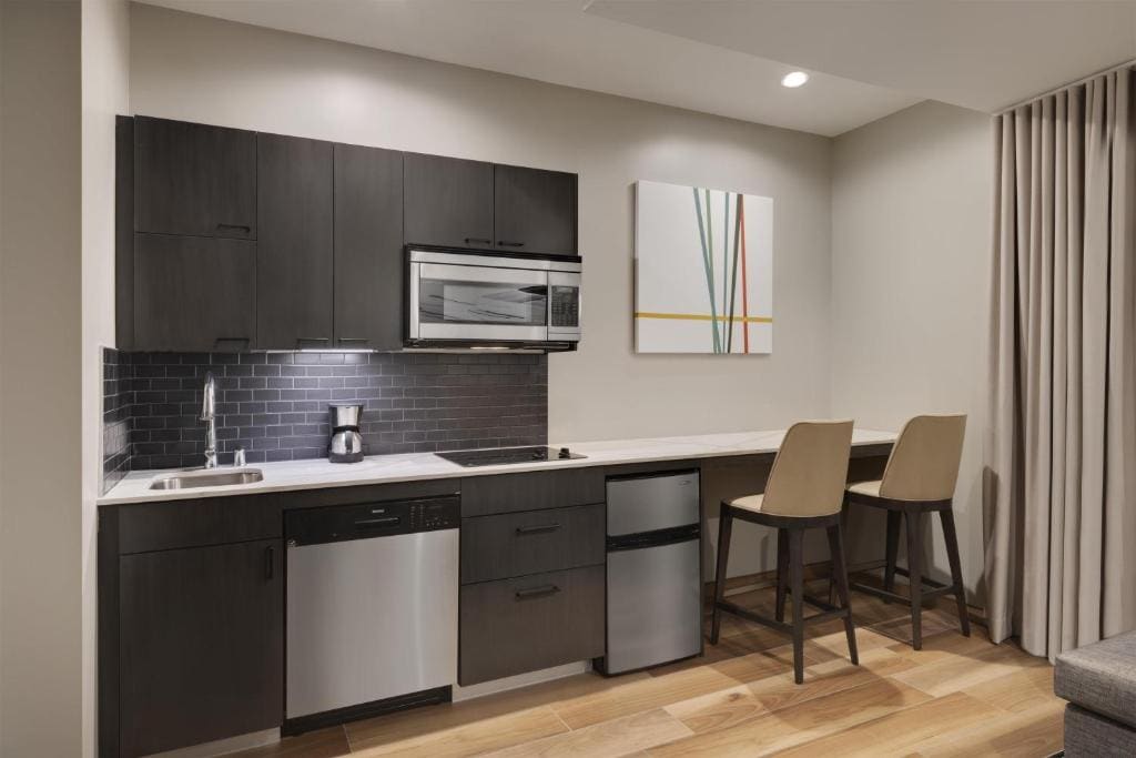 Studio Kitchen Suite (Interior Room) | Two Queen Beds (Plus Sofa Bed) room - Image 1