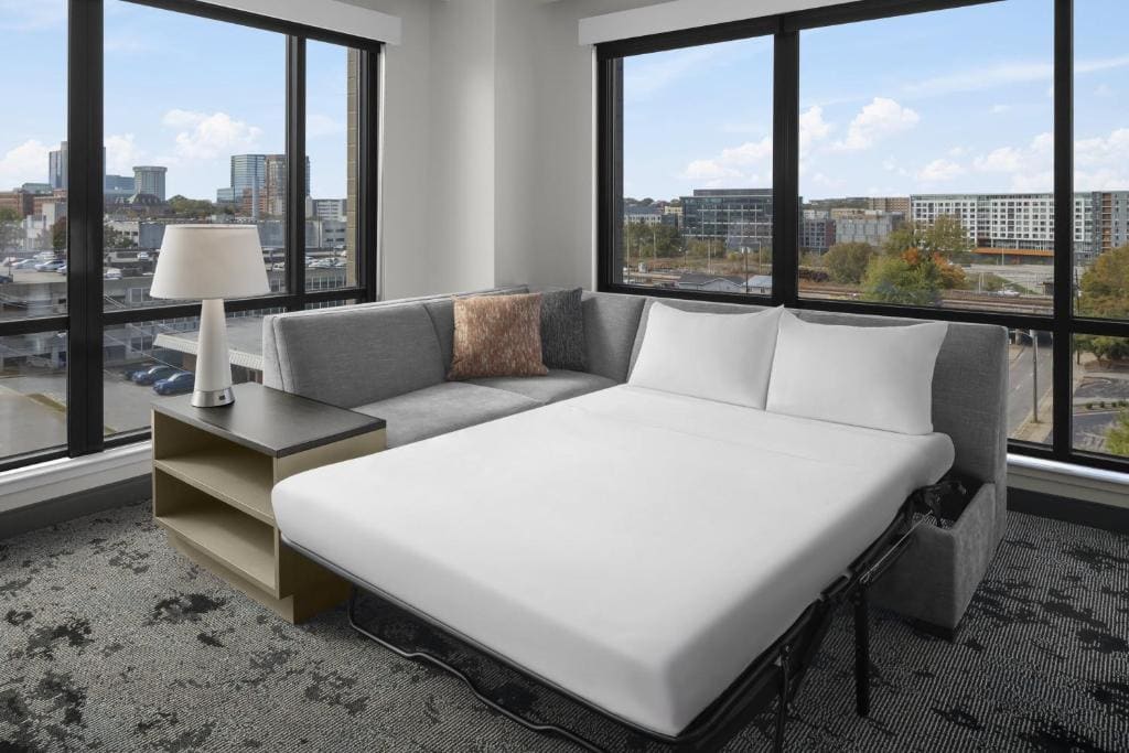 One Bedroom Kitchen Suite with Two Queen Beds and Sofa Bed room - Image 2