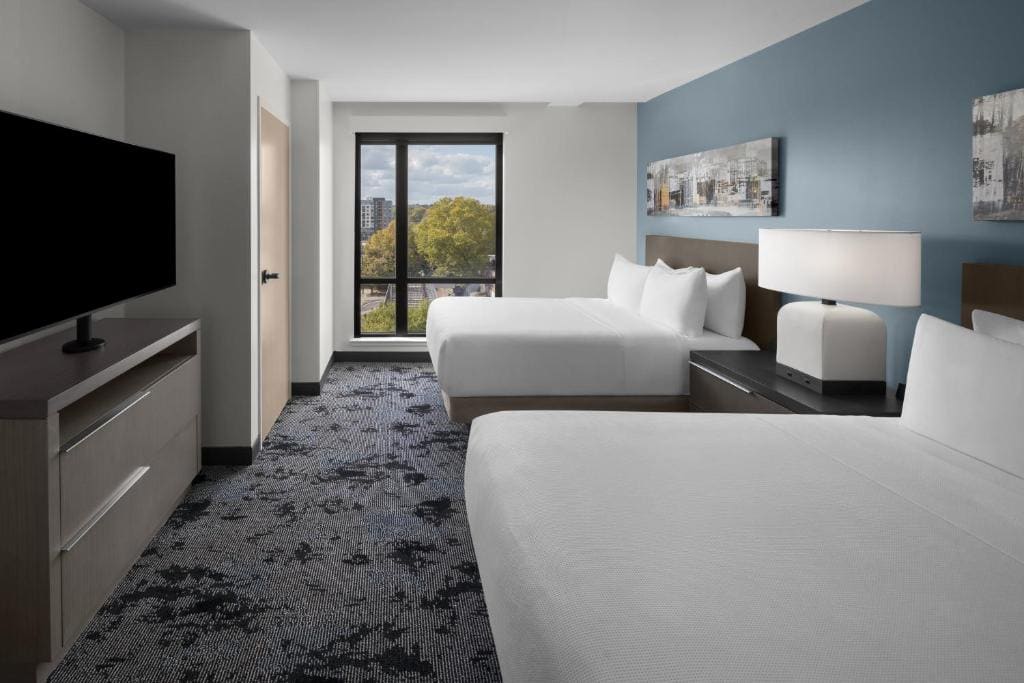 One Bedroom Kitchen Suite with Two Queen Beds and Sofa Bed room - Image 3