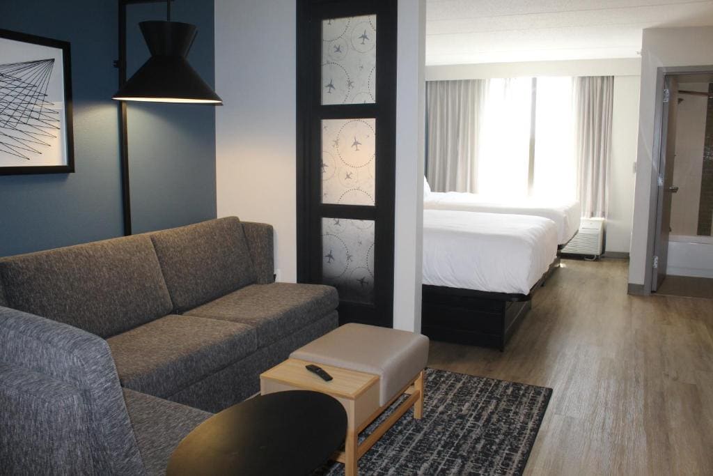 Queen Room with Two Queen Beds and Sofa Bed room - Image 3