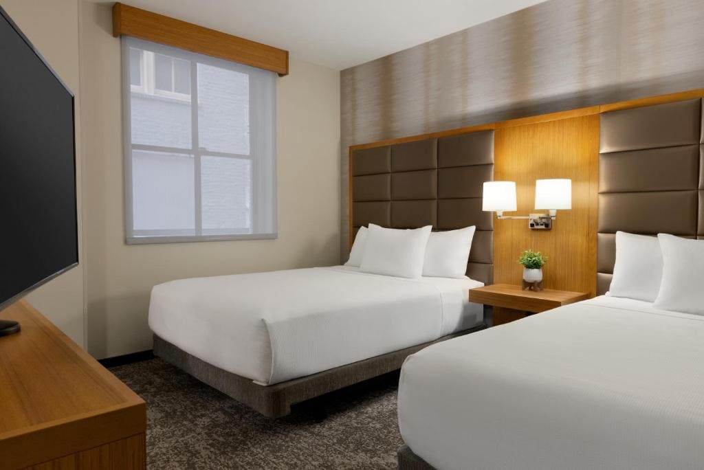 Standard Queen Room with Two Queen Beds and Sofa Bed room - Image 1