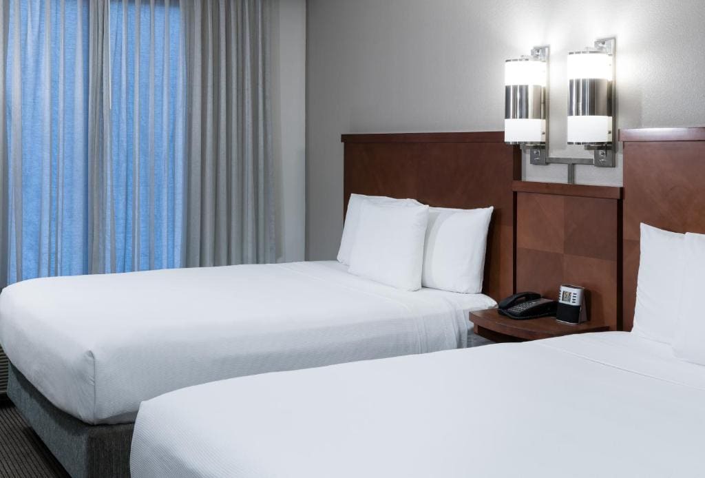 Queen Room with Two Queen Beds and Sofa Bed room - Image 2