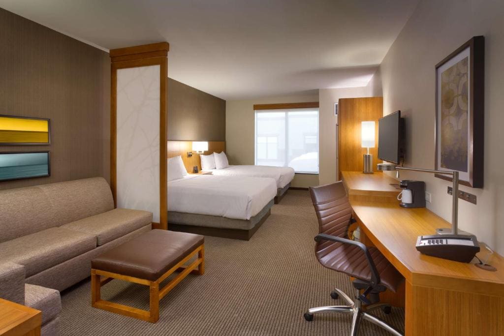 Queen Room with Two Queen Beds and Sofa Bed room - Image 2