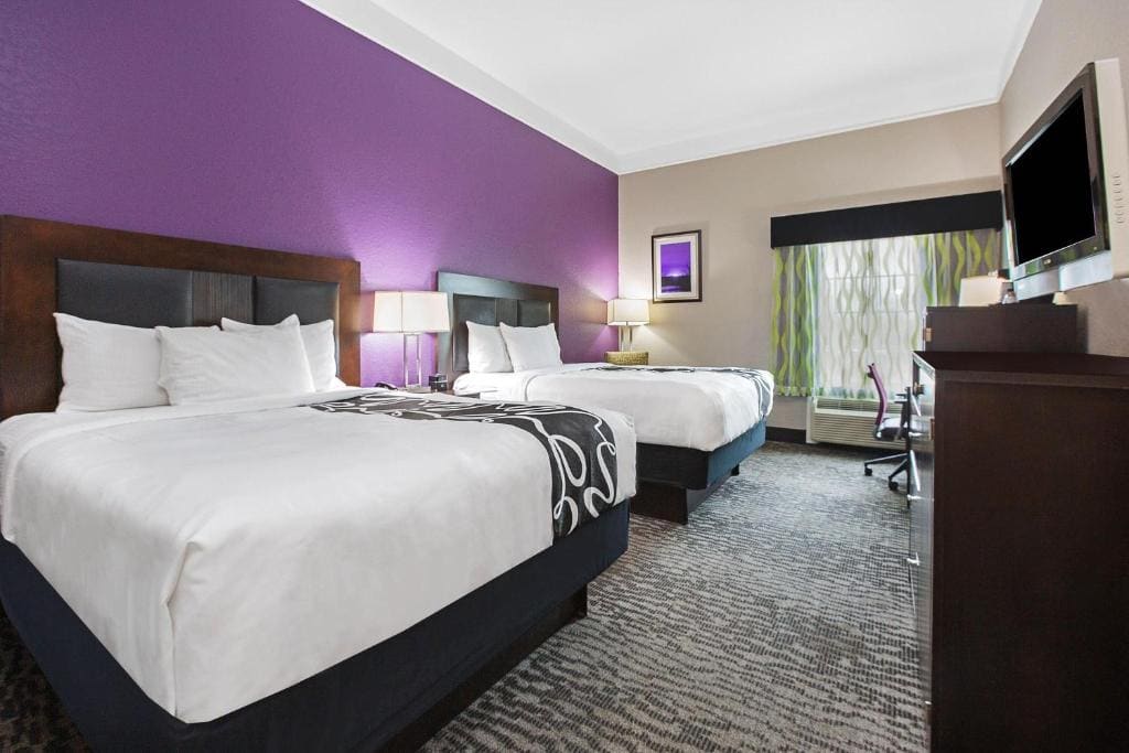 Deluxe Queen Room with Two Queen Beds room - Image 3