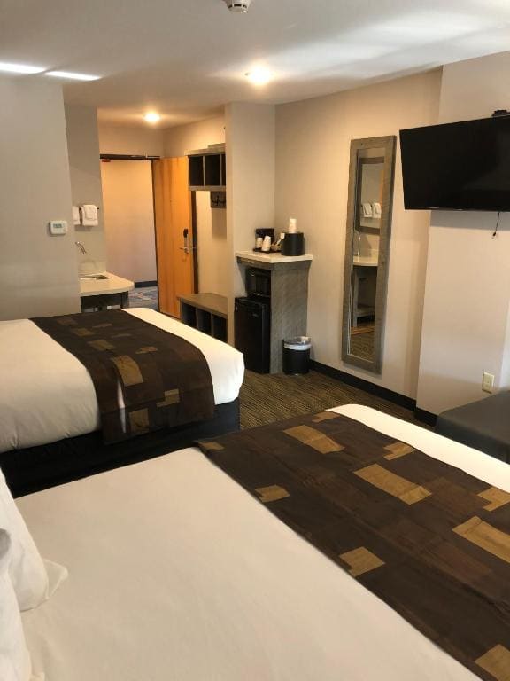 Deluxe Queen Room with Two Queen Beds room - Image 1