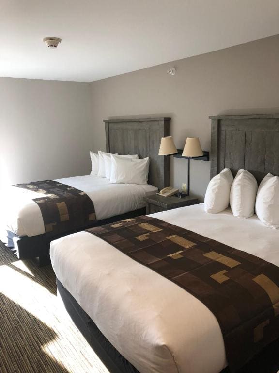 Deluxe Queen Room with Two Queen Beds room - Image 2