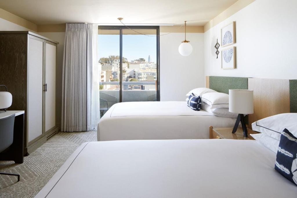 Essential Queen Room with Two Queen Beds and Balcony room - Image 1