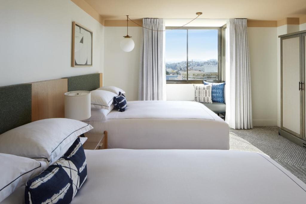 Essential Queen Room with Two Queen Beds and City View room - Image 2