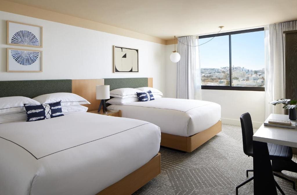 Essential Queen Room with Two Queen Beds and City View room - Image 3