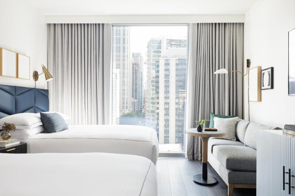 Essential Queen Room with Two Queen Beds and City View room - Image 3