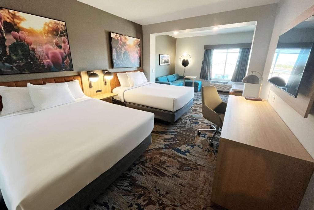 Queen Suite with Two Queen Beds and Sofa Bed room - Image 2