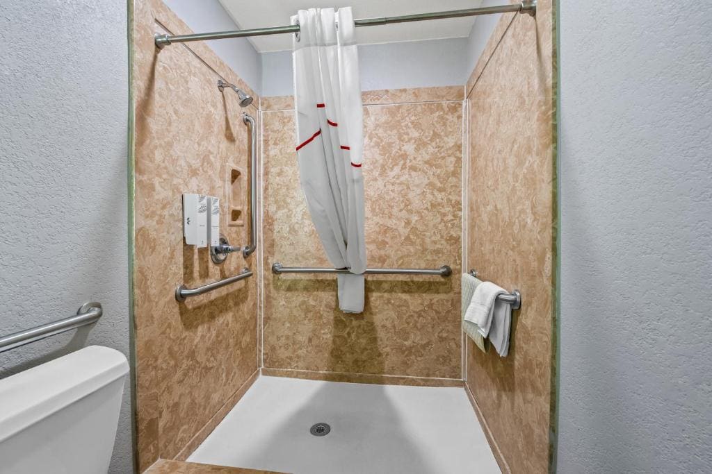Deluxe Room with Two Double Beds Disability Access Roll-in Shower Non-Smoking room - Image 2