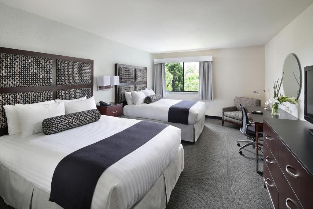 Deluxe Queen Room with Two Queen Beds room - Image 3