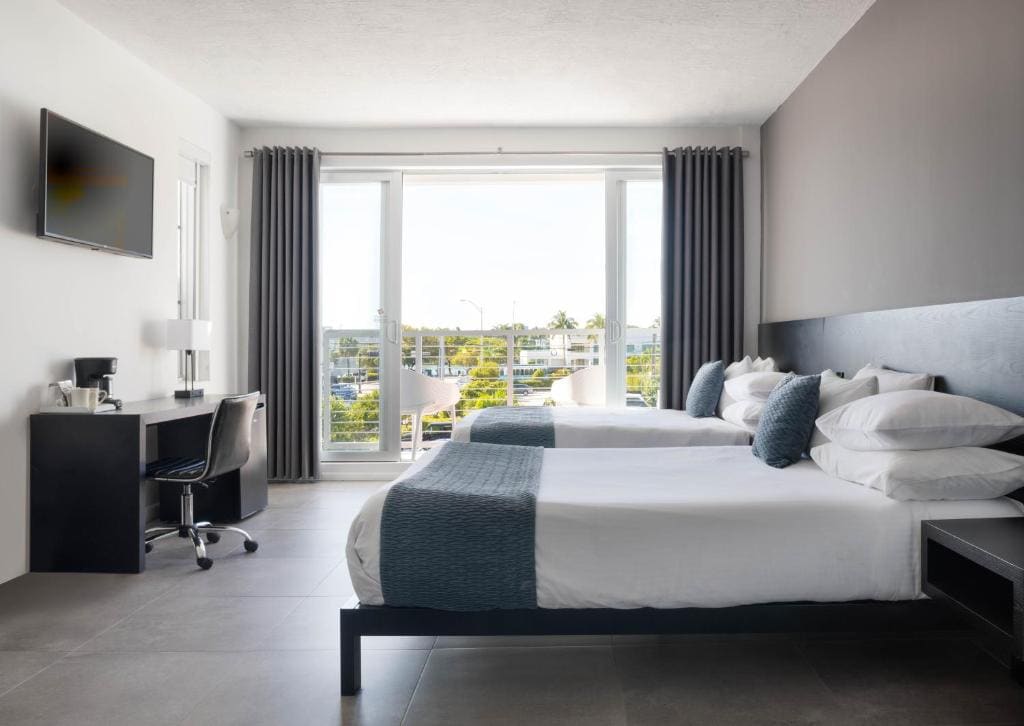 Junior Suite with Two Queen Beds with Balcony and City View - Non-Smoking room - Image 1