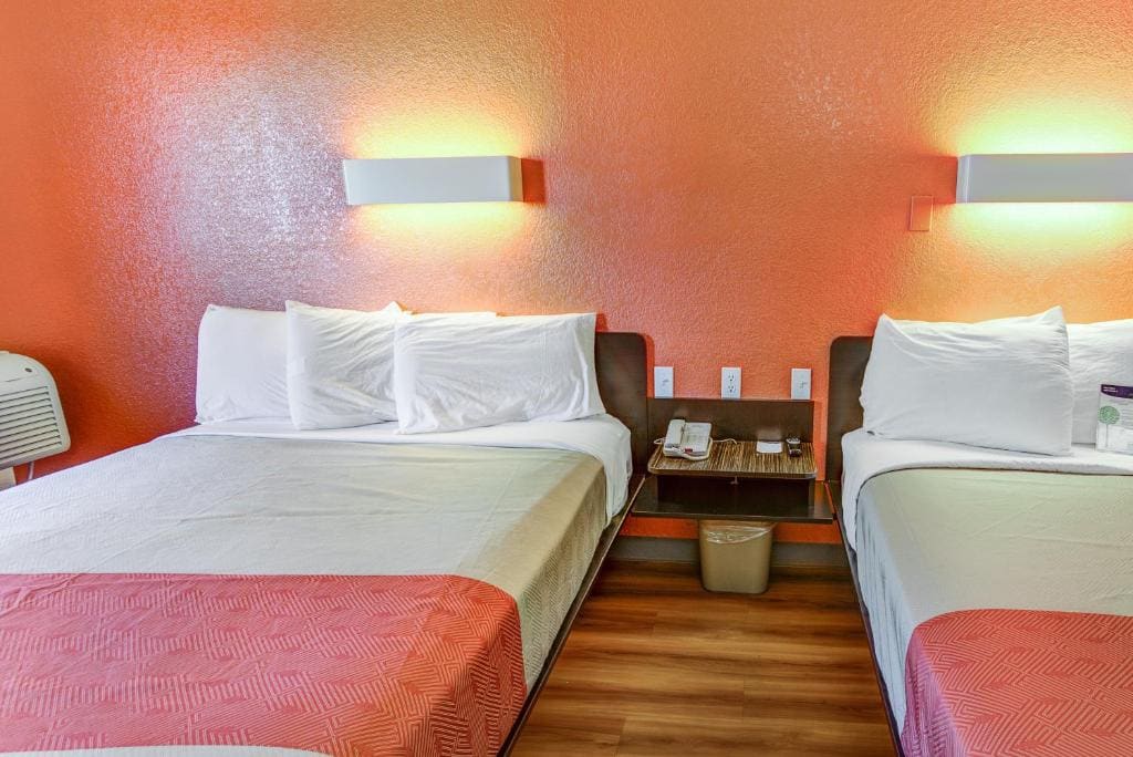 Deluxe Queen Room with Two Queen Beds room - Image 1