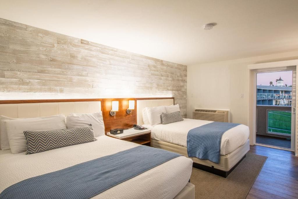 Queen Room with Two Queen Beds and Partial Ocean View room - Image 1