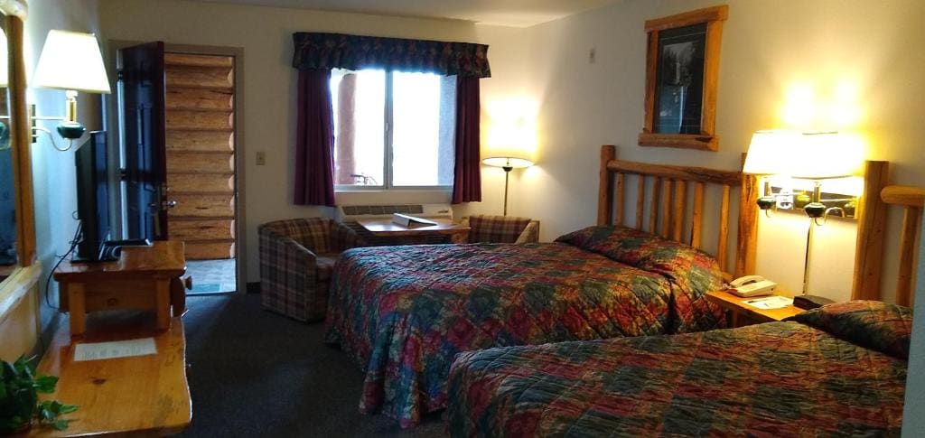 Deluxe Queen Room with Two Queen Beds room - Image 1