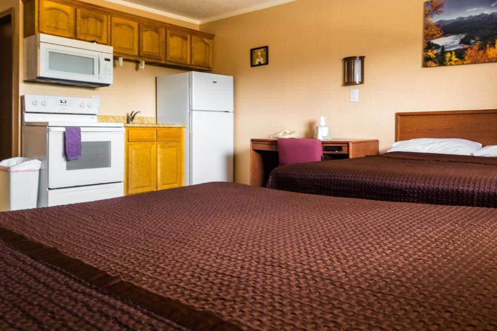 Deluxe Queen Room with Two Queen Beds room - Image 3