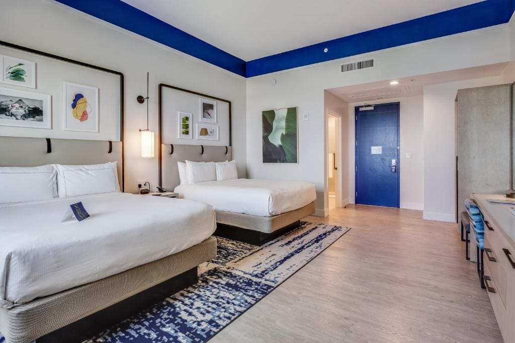 Deluxe Queen Room with Two Queen Beds room - Image 2