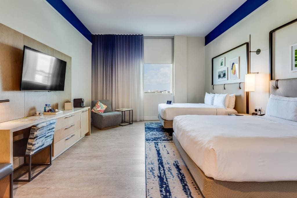 Deluxe Queen Room with Two Queen Beds room - Image 1