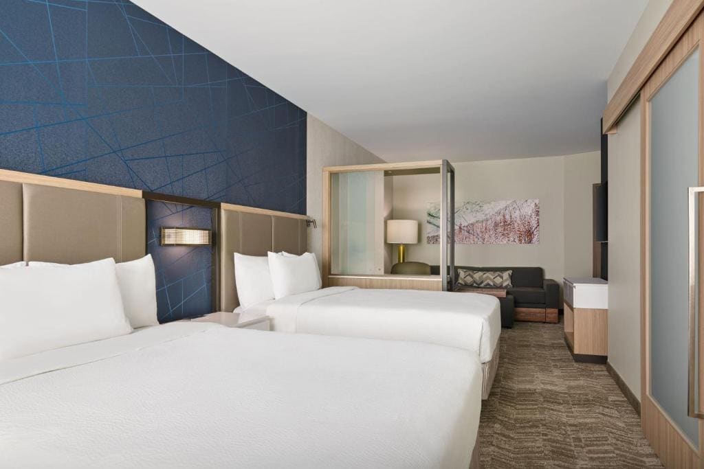 Studio Suite, 2 Queen Beds with Sofa Bed room - Image 3