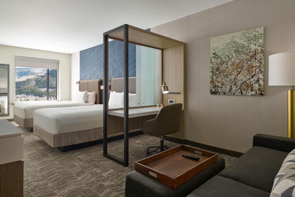 Studio Suite, 2 Queen Beds with Sofa Bed room - Image 2