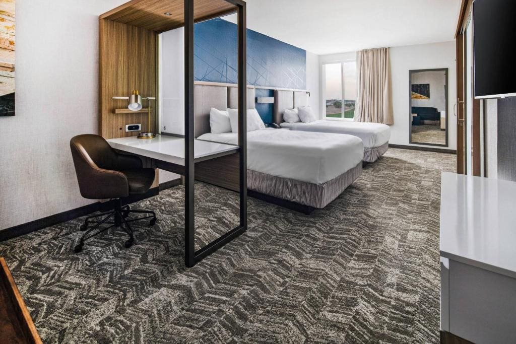 Queen Suite with Two Queen Beds and Trundle Sofa room - Image 1