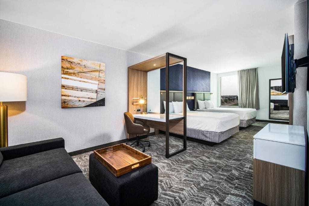 Queen Suite with Two Queen Beds and Trundle Sofa room - Image 2