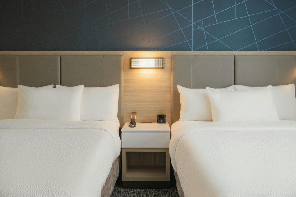 Queen Suite with Two Queen Beds and Trundle Sofa room - Image 3