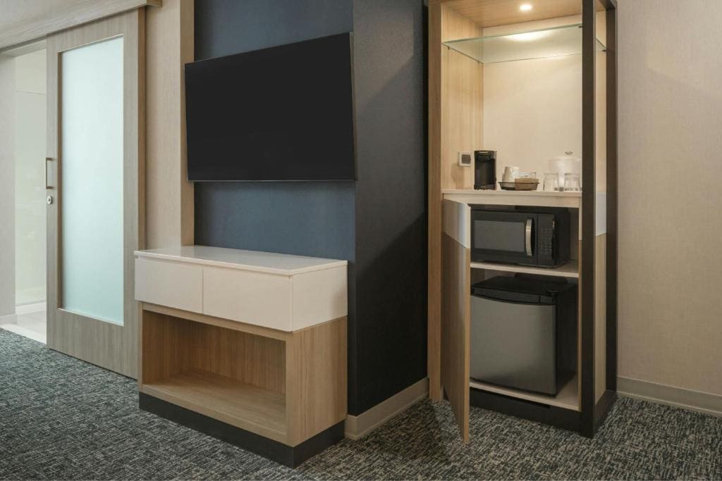 Queen Suite with Two Queen Beds and Trundle Sofa room - Image 1