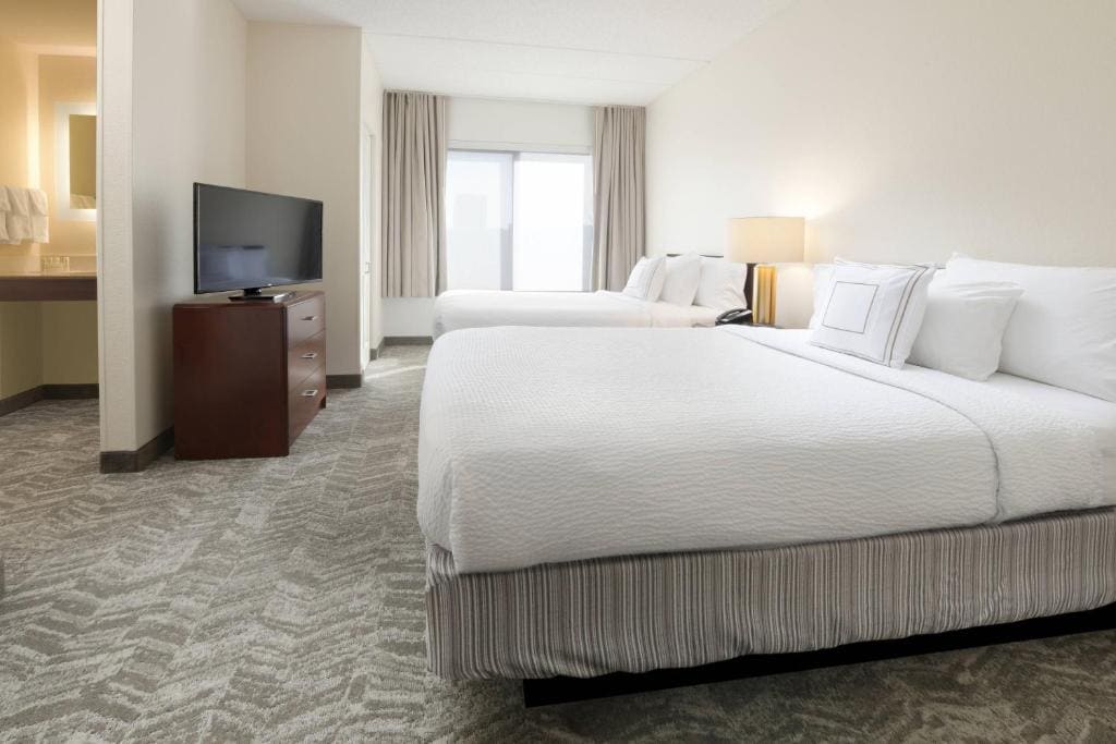 Double Suite with Two Double Beds and Sofa Bed room - Image 2