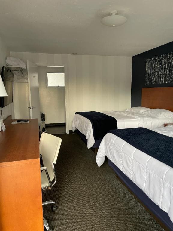 Deluxe Queen Room with Two Queen Beds room - Image 2