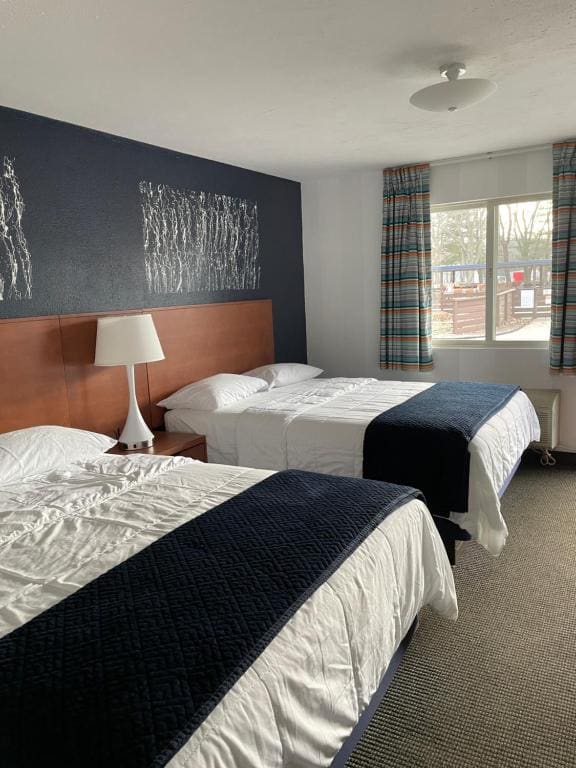 Deluxe Queen Room with Two Queen Beds room - Image 3