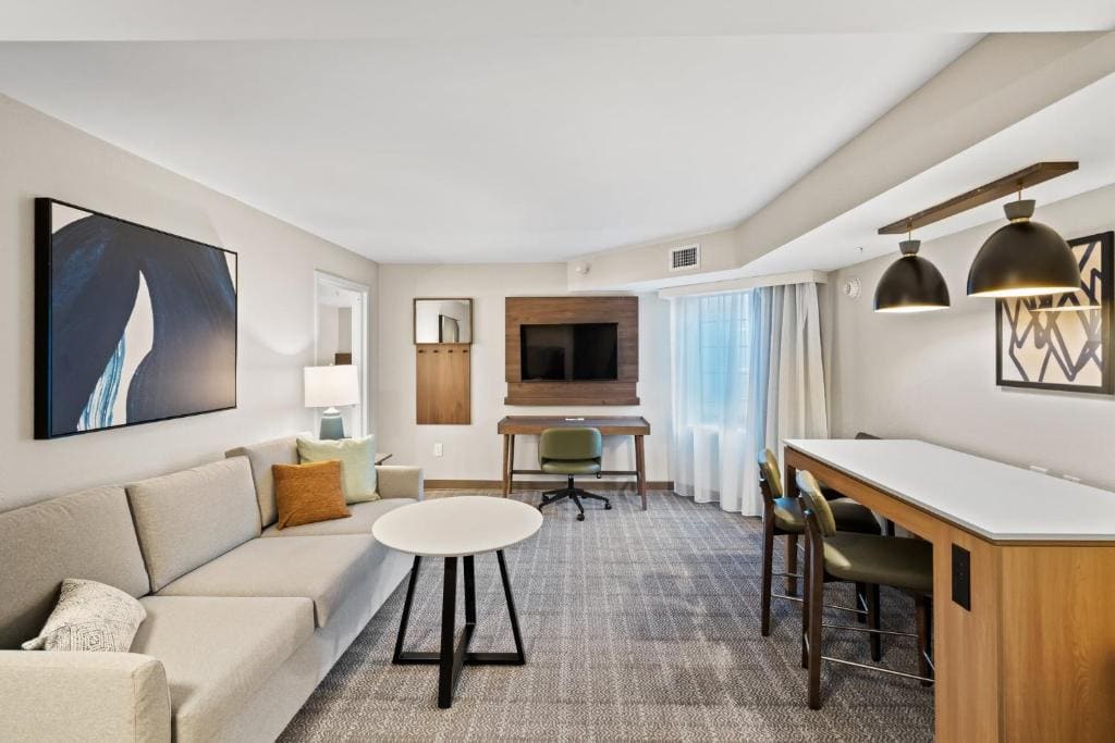 Two-Bedroom Suite with One King Bed, Two Queen Beds and One Sofa Bed room - Image 1