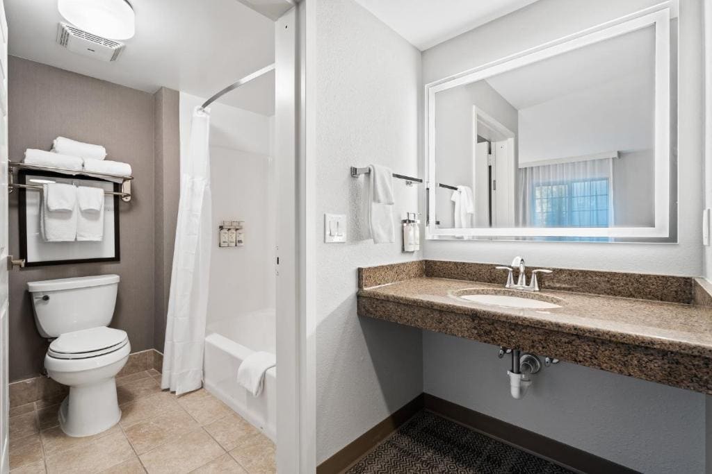 Two-Bedroom Suite with One King Bed, Two Queen Beds and One Sofa Bed room - Image 2
